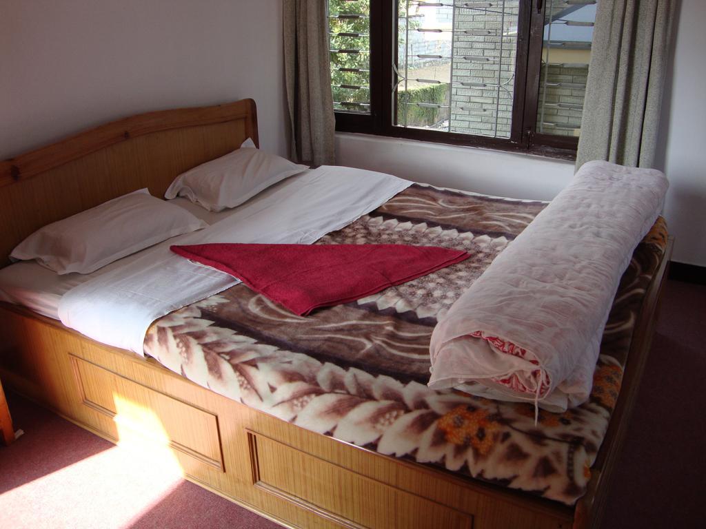 New Summit Guest House Pokhara Quarto foto