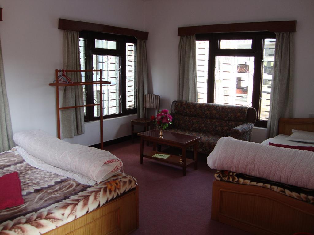 New Summit Guest House Pokhara Quarto foto
